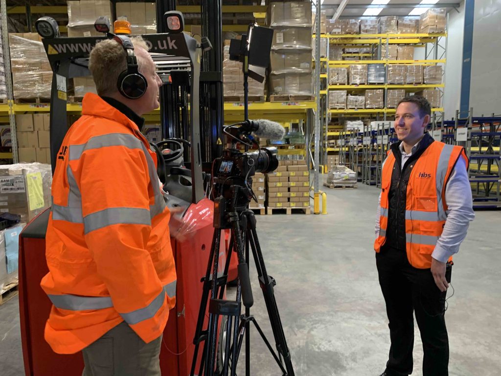 Capture 1 crew filming a business interview on location