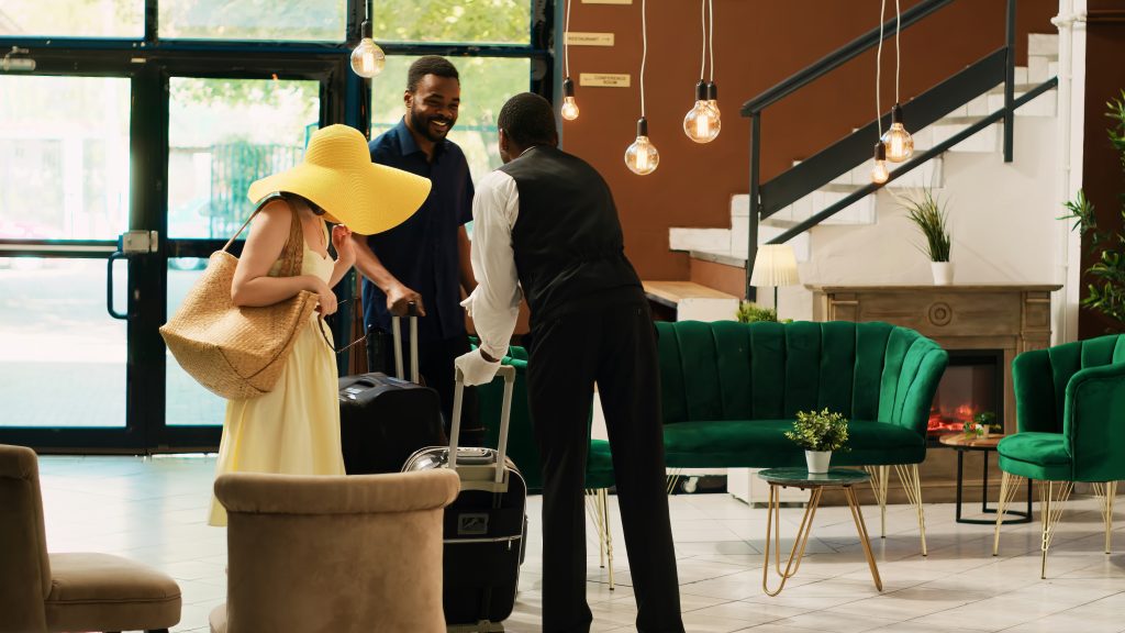Guests arriving at a hotel with luggage