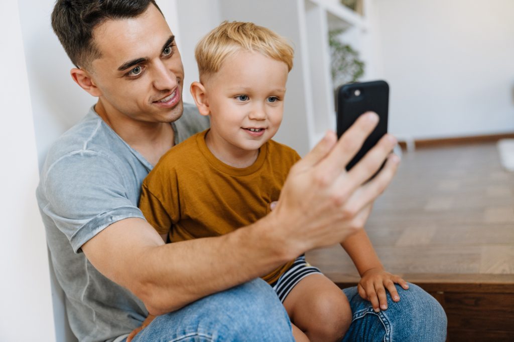 Parent using WhatsApp with child